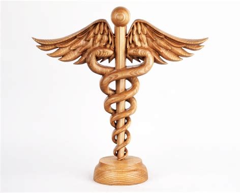 Wooden Caduceus Statues .